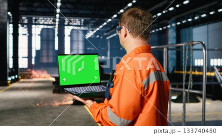 Isolated mockup with technician coordinating strong labor involvement in industry plant, heavy production workflow essential to modern manufacture inside the industrial environment. 133740480