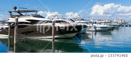 Luxury boat. Marina in Miami Beach, Florida USA. Yacht boat docked on sea Biscayne bay. Downtown Miami Marina with luxury yacht boat. Summer vacation. Luxurious yacht marina. Yacht rental Luxury boat. Marina in Miami Beach, Florida USA. Yacht boat docked on sea Biscayne bay. Downtown Miami Marina with luxury yacht boat. Summer vacation. Luxurious yacht marina. Yacht rental 133741468