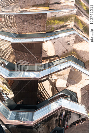 New York City, USA - April 28, 2024: Hudson Yards. The Vessel. Modern Art staircase. Architectural marvel. Vessel building in Hudson Yards in NYC. Modern architecture building Vessel spiral staircase New York City, USA - April 28, 2024: Hudson Yards. The Vessel. Modern Art staircase. Architectural marvel. Vessel building in Hudson Yards in NYC. Modern architecture building Vessel spiral staircase 133741515