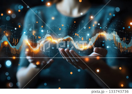 A woman is holding a hand up to a screen displaying a graph. Concept of excitement and curiosity 133743736