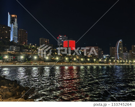 colorful skyline feature by coast, distinctive structure brightening evening skyline colorful skyline feature by coast, distinctive structure brightening evening skyline 133745264