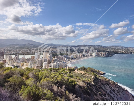 coastal city panorama, aerial view of seaside metropolis, cliffside overlook of coastal city and bay 133745522
