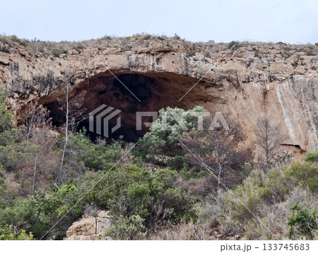weathered sandstone cave, sandstone cave carved into cliffs showcasing weathering and natural weathered sandstone cave, sandstone cave carved into cliffs showcasing weathering and natural 133745683