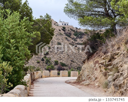 bright sky over rugged cliffs, coastal limestone bluff with vivid blue sky and rugged landscape bright sky over rugged cliffs, coastal limestone bluff with vivid blue sky and rugged landscape 133745745