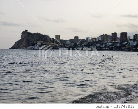 coastal fortress scene, dusk over rocky seaside fortress, seaside fortress on rocky promontory 133745815