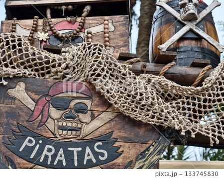 weathered piratethemed display with beads, piratethemed market setup featuring aged look and beads 133745830
