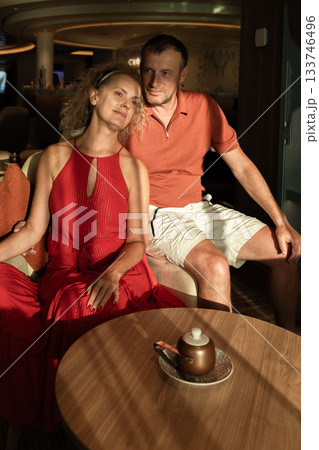 Couple in love on cruise ship. Man and woman in love enjoying their romantic vacation. Vertical photo. High quality photo 133746496