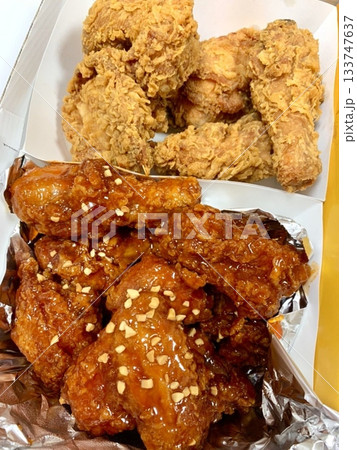 Crispy fried chicken with golden, crunchy skin and juicy, tender meat. A delicious and savory dish, perfect for any meal, served with dipping sauces or side dishes for extra flavor! Crispy fried chicken with golden, crunchy skin and juicy, tender meat. A delicious and savory dish, perfect for any meal, served with dipping sauces or side dishes for extra flavor! 133747637