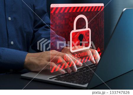 ランサムウェアとサイバー攻撃。データを暗号化するサイバー犯罪。ウイルスに感染したパソコンを使おうとし ランサムウェアとサイバー攻撃。データを暗号化するサイバー犯罪。ウイルスに感染したパソコンを使おうとし 133747826