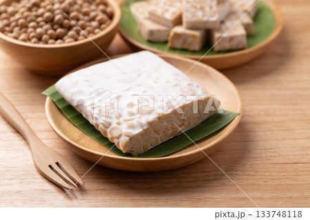 Tempeh made from fermented soybeans, Healthy vegan and plant based ingredients Tempeh made from fermented soybeans, Healthy vegan and plant based ingredients 133748118