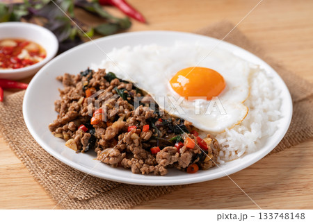 Thai food, Stir fried holy basil with minced pork with cooked rice and fried egg on top 133748148