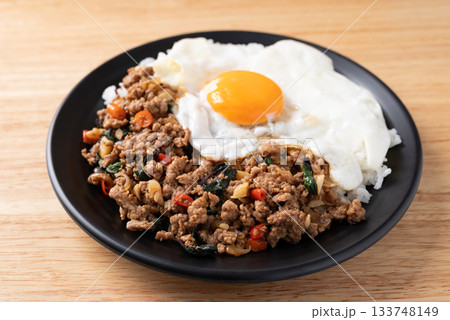 Thai food, Stir fried holy basil with minced pork with cooked rice and fried egg on top 133748149