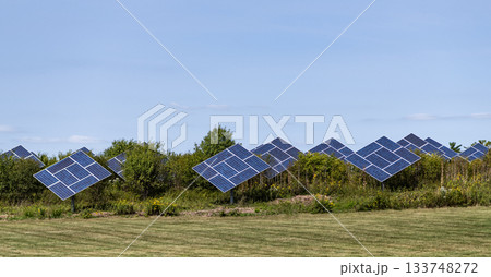 Photovoltaic technology for eco-friendly electricity production. Solar power station. Renewable energy solutions through solar power. Solar panel. Sustainable renewable energy. Green energy solutions Photovoltaic technology for eco-friendly electricity production. Solar power station. Renewable energy solutions through solar power. Solar panel. Sustainable renewable energy. Green energy solutions 133748272
