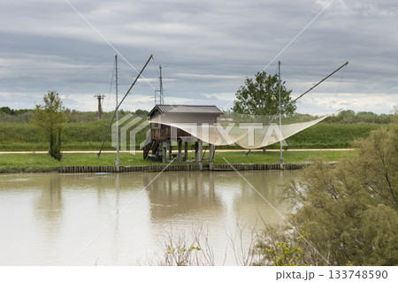 Fisherman's house on the canal, Porto Garibaldi, Ferrara, Italy 133748590