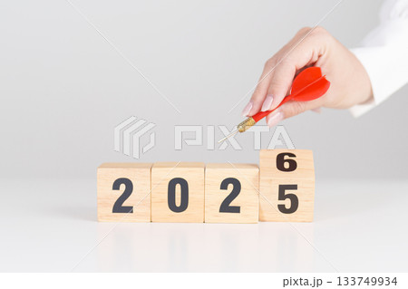 red dart with  chess people and 2026 year blocks.. Goal, plan, action, target, strategy, leadership, New Year and marketing concept 133749934