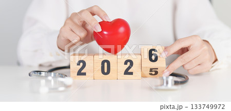 2025 end year to Happy New Year 2026 with Stethoscope of doctor and heart shape on table. health care, Insurance, Wellness and medical concepts 2025 end year to Happy New Year 2026 with Stethoscope of doctor and heart shape on table. health care, Insurance, Wellness and medical concepts 133749972