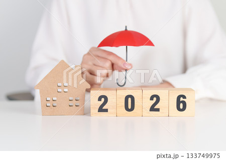 Happy New Year 2026 with red umbrella over money stack. Insurance, real estate, Home loan, tax, investment, mortgage, financial, savings, protection and safety Happy New Year 2026 with red umbrella over money stack. Insurance, real estate, Home loan, tax, investment, mortgage, financial, savings, protection and safety 133749975