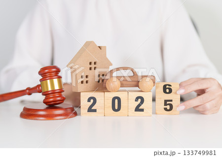 Happy New Year 2026 with house and Car model and gavel justice hammer on desk in courthouse. Real Estate and Car Law, Home Insurance, property Tax, Auction and Bidding concepts 133749981