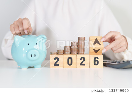2026 New year with change to UP and Down arrow with coin stack. Interest rate, GDP, stocks market, financial, deflation and Inflation, mortgage, debt, Loan and Economic Recession 2026 New year with change to UP and Down arrow with coin stack. Interest rate, GDP, stocks market, financial, deflation and Inflation, mortgage, debt, Loan and Economic Recession 133749990