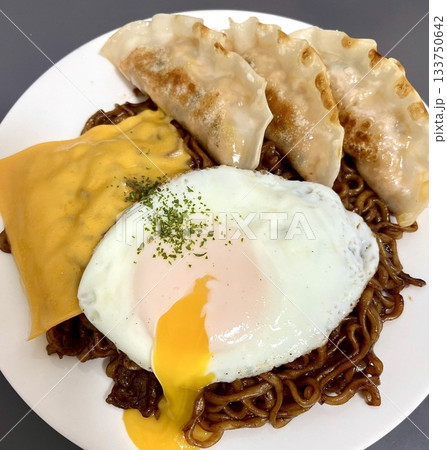Savory jjapagetti with rich, black bean sauce and chewy noodles, paired with crispy, flavorful mandu. A delicious and satisfying Korean comfort food combination, perfect for any meal! Savory jjapagetti with rich, black bean sauce and chewy noodles, paired with crispy, flavorful mandu. A delicious and satisfying Korean comfort food combination, perfect for any meal! 133750642