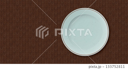 Top view of empty green mint circle dish place on brown tablecloth background 133752811