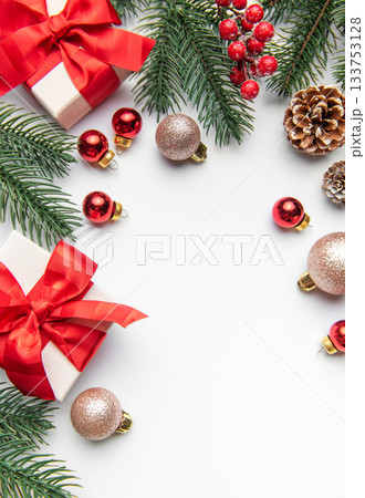 Christmas presents with fir branches and holiday decorations 133753128