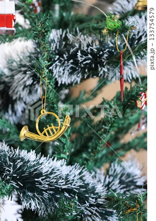 Christmas decoration on the christmas tree, closeup of photo. 133754579