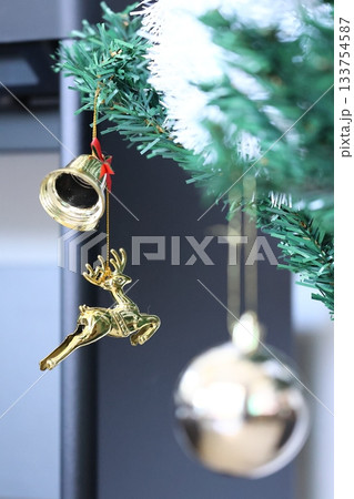christmas bell and angel on the tree, closeup of photo christmas bell and angel on the tree, closeup of photo 133754587