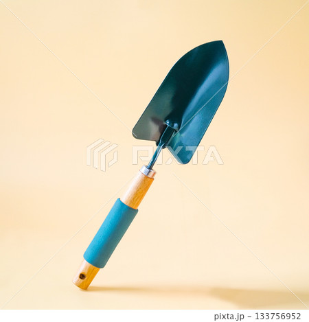 Gardening shovel on color background.Garden tool. 133756952