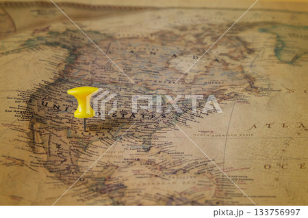 The color pins on old map,point on location. 133756997