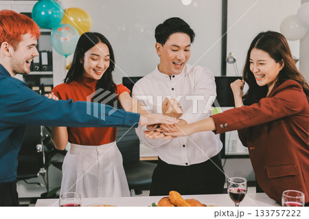 Diversity, dinner and group of people toast celebration together at party. Friends, happy and celebrate with food, wine and friendship for love, support and cheers champagne at business function Diversity, dinner and group of people toast celebration together at party. Friends, happy and celebrate with food, wine and friendship for love, support and cheers champagne at business function 133757222