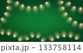 Christmas fairy lights green background with festive yellow light bulb garlands and copy space 133758114