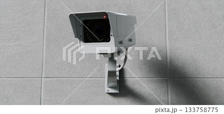 Security camera, surveillance and mounted on wall, total control background 133758775