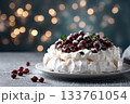 Pavlova Cake with berry cranberries with christmas lught background 133761054