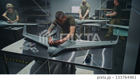 Techs Building Unmanned Aircraft For Strategic Advantage. Techs Building Unmanned Aircraft For Strategic Advantage. 133764961
