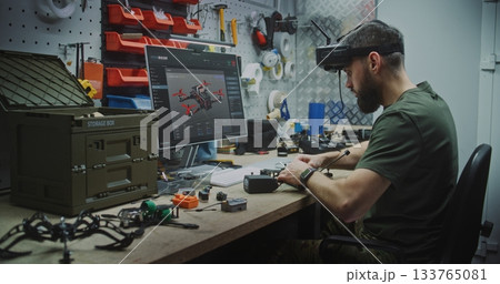 Engineer Using VR Goggles to Virtually Design 133765081
