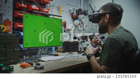 Engineer Building Drone With Dedicated Computer Display 133765103