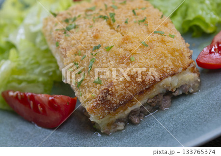 Hachis parmentier, french dish with mashed potato and minced beef Hachis parmentier, french dish with mashed potato and minced beef 133765374