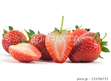 Close up of organic red strawberries on white background Close up of organic red strawberries on white background 133766733