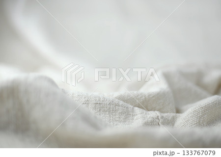 White cotton pile Hand-woven background, focus on the middle and blurry in the front and back 133767079