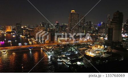 Skyscrapers in Bangkok city and river at night Skyscrapers in Bangkok city and river at night 133768069