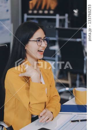 Business woman using calculator for do math finance on wooden desk in office and business working background, tax, accounting, statistics and analytic research concept. Business woman using calculator for do math finance on wooden desk in office and business working background, tax, accounting, statistics and analytic research concept. 133768253