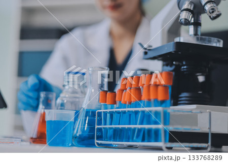 Portrait, science and happy woman on laptop in lab to research chemistry, test or innovation. Microscope, scientist and face of medical doctor in goggles for microbiology, healthcare or pharma study Portrait, science and happy woman on laptop in lab to research chemistry, test or innovation. Microscope, scientist and face of medical doctor in goggles for microbiology, healthcare or pharma study 133768289