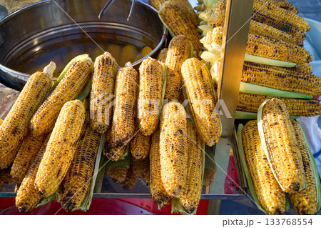 Grilled corn on the cob, a popular street food. Freshly cooked and ready to eat. 133768554