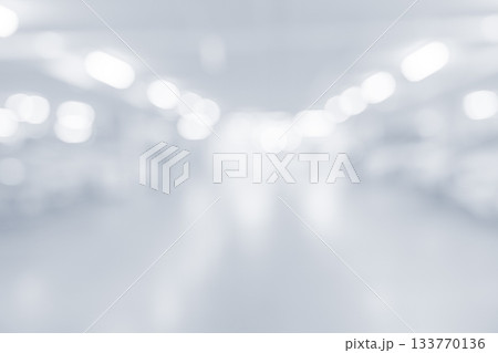 Clean bright blurred parking interior with soft illumination and abstract white background Clean bright blurred parking interior with soft illumination and abstract white background 133770136