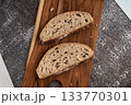 Whole grain sourdough bread slices with crust texture 133770301