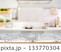 Marble countertop with blurred modern kitchen background 133770304