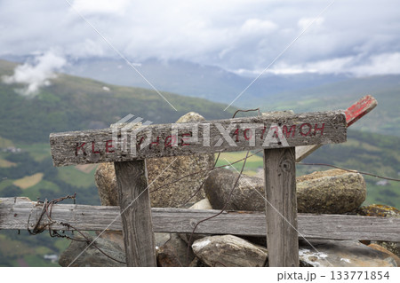 Sign indicating Kleivhoe mountain at 1073 meters in Randen, Norway on a cloudy day 133771854