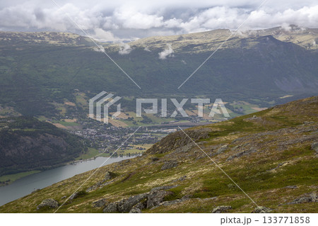 Breathtaking view of lake Vagavatnet from Kleivhoe mountain in Randen, Norway on a cloudy day in summer Breathtaking view of lake Vagavatnet from Kleivhoe mountain in Randen, Norway on a cloudy day in summer 133771858