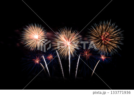 Many flashing colorful fireworks in event amazing with black background celebrate New Year. 133771936